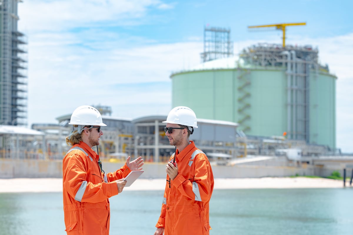 Engineers inspecting containment equipment at a low-temperature gas facility