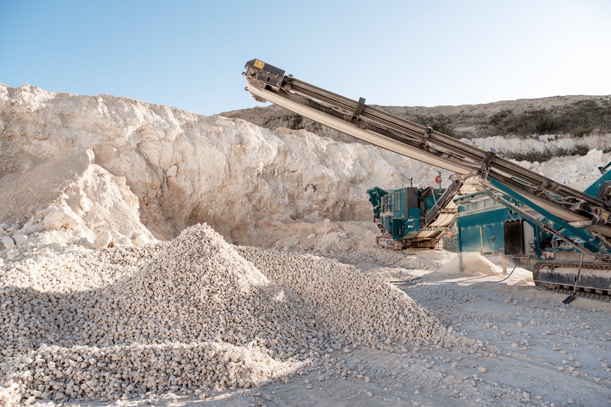 Inspection setup for checking 63.5% Fe Iron Ore sample, size and quality documentation.
