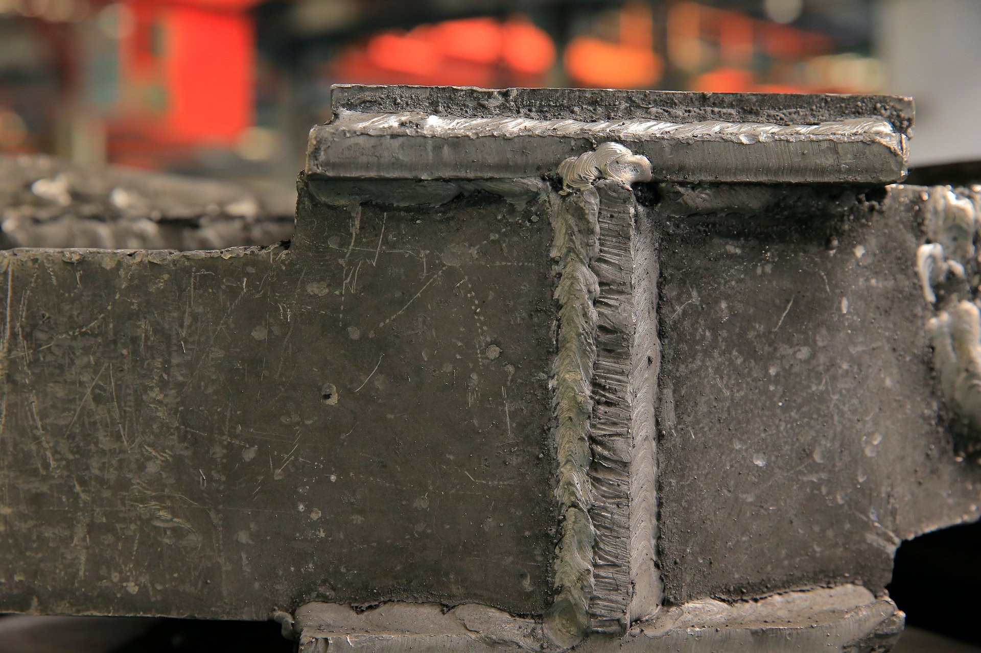 Steel sheet bundles being handed over between parties at a port loading point