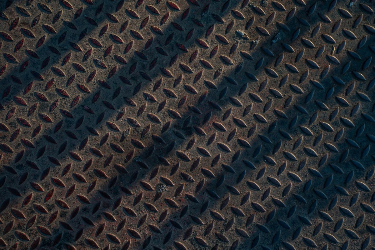 Steel plate surface detail with scale reference edges